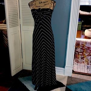 Jennifer Lopez long black pinstriped dress